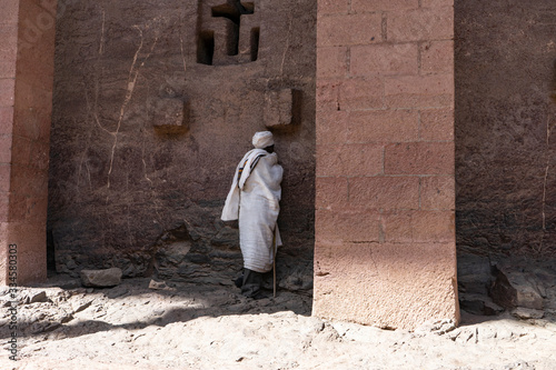 man in front of wall