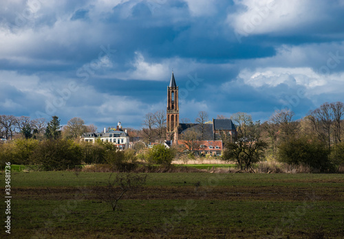 old church in landscape in holland