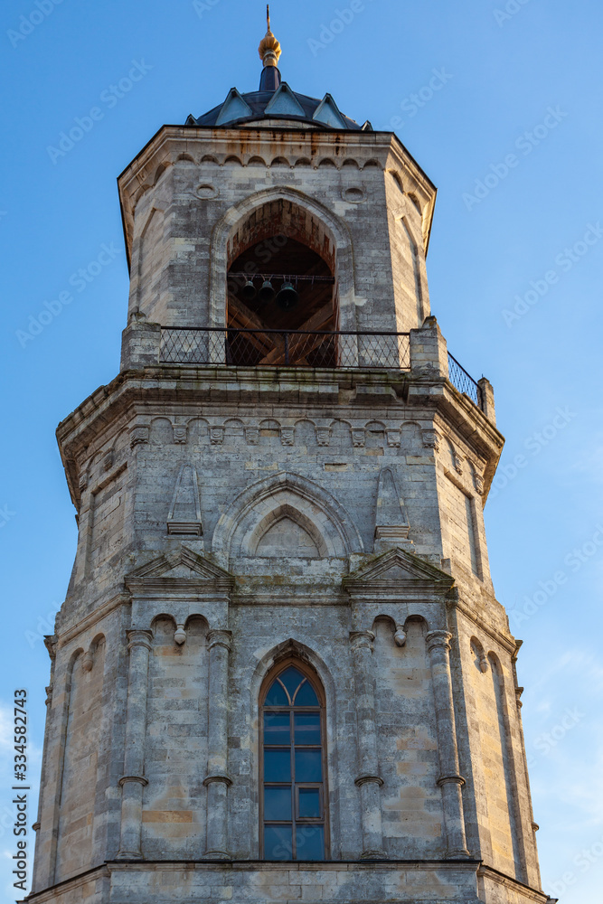 Decrepit bell tower of the Church of the Vladimir Icon of the Mother of God in Bykovo (Russia)