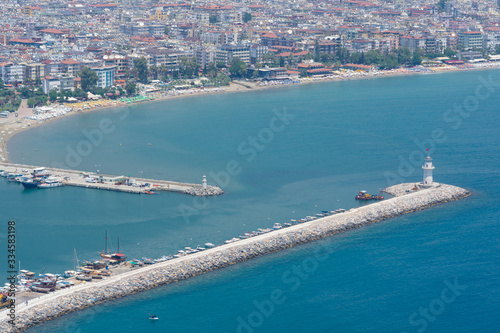 Alanya. Turkey. Mediterranean Sea. Sea port of Alanya and the lighthouse. View from the bird's-eye view.