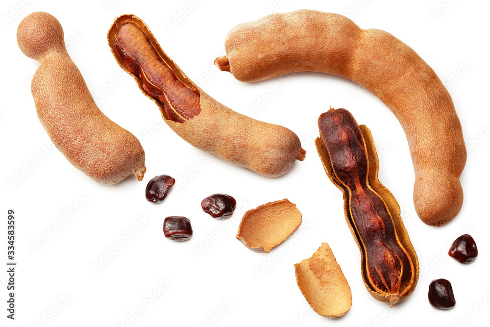 fresh tamarind fruits isolated on white background. top view fresh tamarind fruits isolated on white background. top view