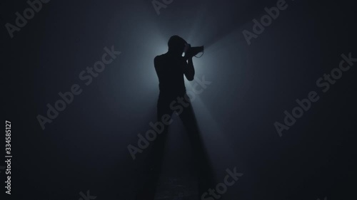 Photographer in dark