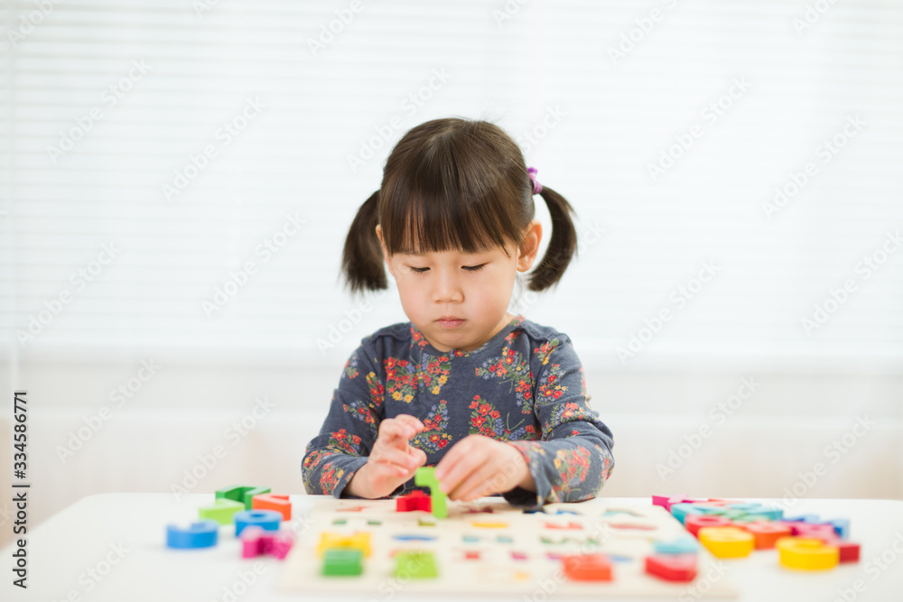 toddler girl learning letter blocks for homeschooling toddler girl learning letter blocks for homeschooling