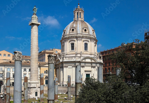 Trajan's Column and The Church of the Most Holy Name of Mary at the Trajan Forum, Rome, Italy.