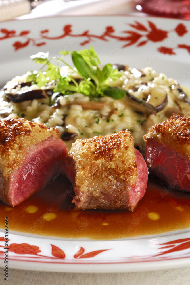 Lamb crusted with almond and mushroom risotto Lamb crusted with almond and mushroom risotto