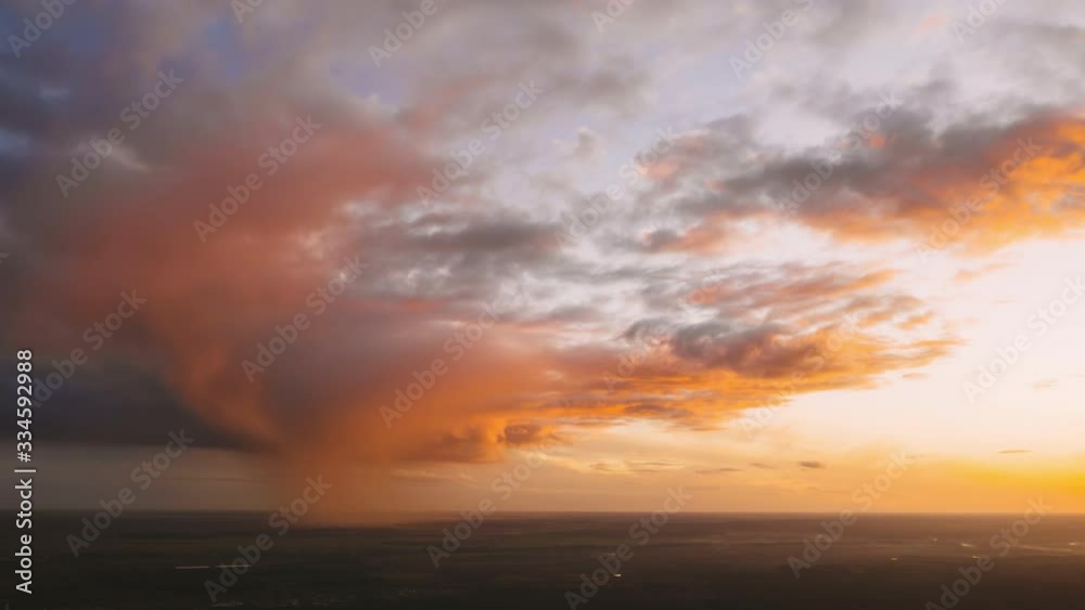 Sunset Bright Dramatic Sky. Scenic Colorful Sky At Sunset Dawn. Hyperlapse Sunset Bright Dramatic Sky. Scenic Colorful Sky At Sunset Dawn. Hyperlapse