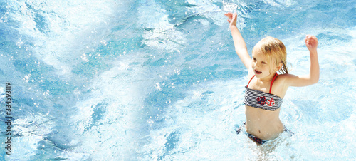 Little girl having fun time in the Swimming pool, Summer time, Vacation