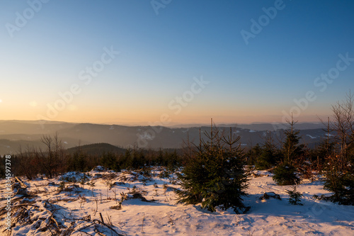 Gorgeous winter landscape with mountains in the background early morning, Czech © Martin