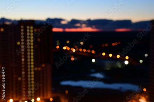 Blurred midnight city backgound., view from window. © Anastasiya