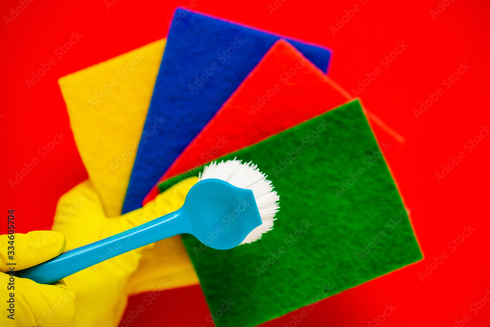 Products for professional cleaning on red background Products for professional cleaning on red background