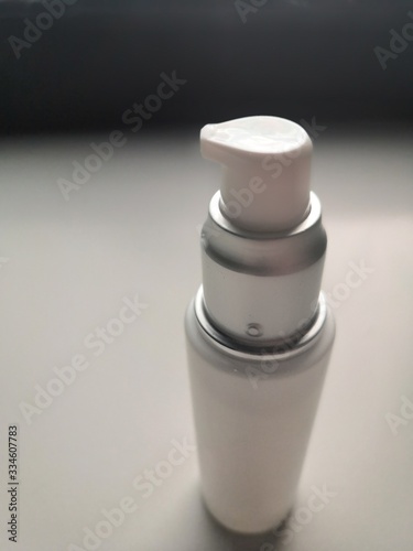 perfume bottle on black background