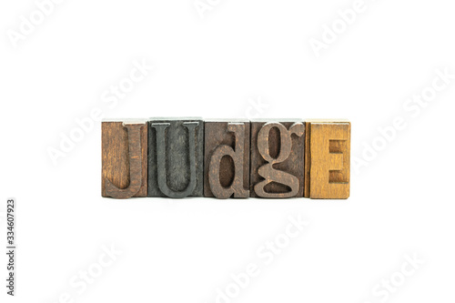 Judge in wood block letters