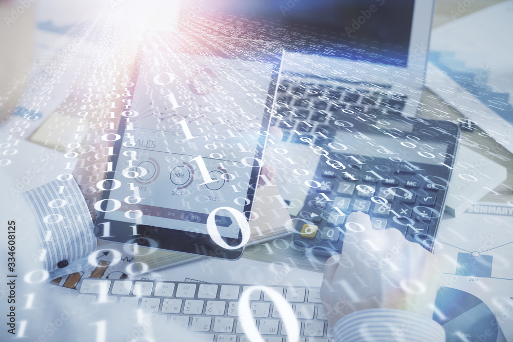 Double exposure of man's hand holding and using a digital device and data theme hologram drawing. Technology concept. Double exposure of man's hand holding and using a digital device and data theme hologram drawing. Technology concept.