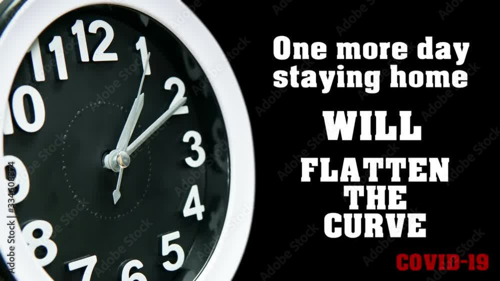 Clock dial close-up with COVID-19 pandemic quote: One more day staying home will flatten the curve. Table business timer face time lapse. Quarantine time and self isolation Coronavirus concept. 4k.