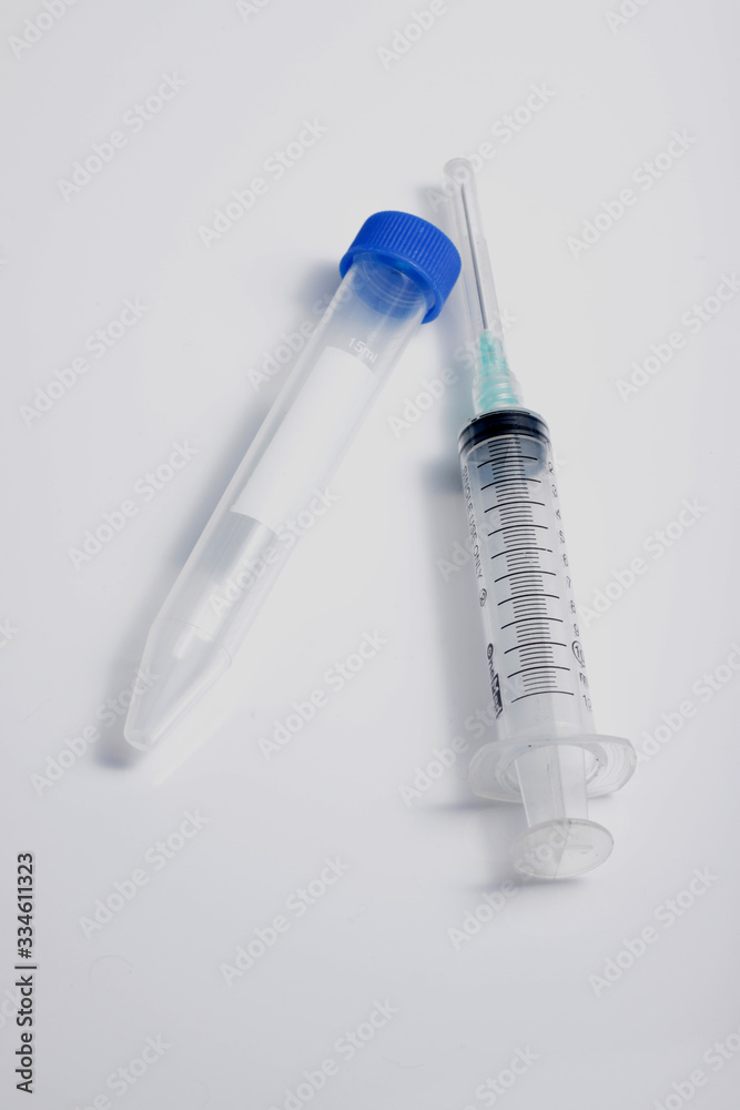 custom made wallpaper toronto digitalClose up shot of medical syringe and test tube for laboratory testing purpose, isolated on white background