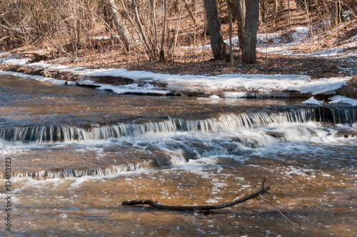 Baird Creek waterfall in slow motion, on the Niagara Escarpment, medium view.