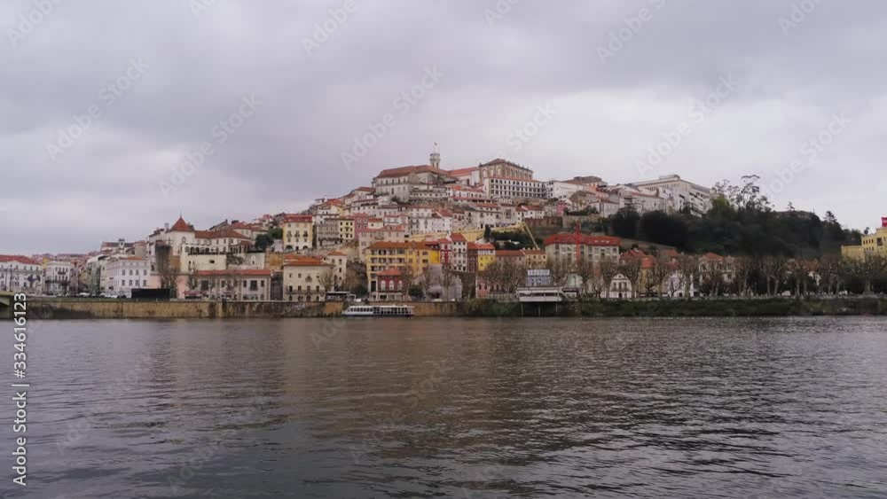 Beautiful aerial across the Modego River towards Coimbra, Portugal.