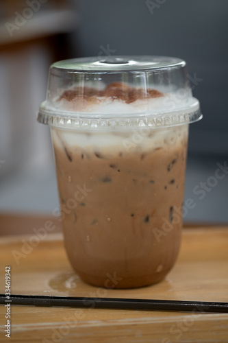 Iced coffee mocha in clear plastic glass