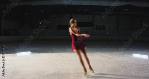 Girl figure skater performing routine