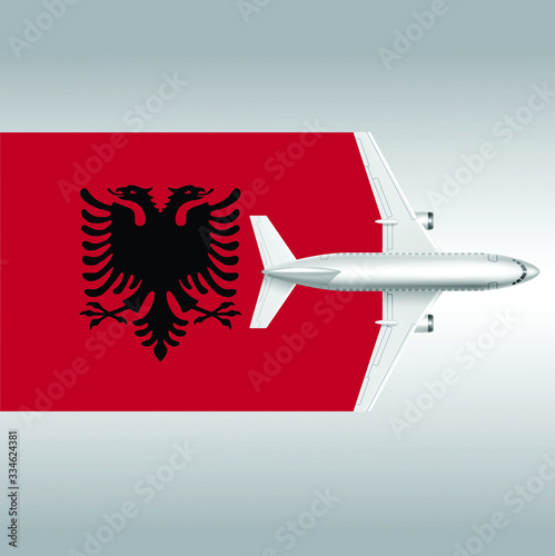 Plane and flag of Albania. Travel concept for design