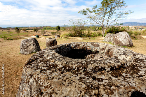 The Plain of Jars is Ancient stone a megalithic archaeological landscape in Xieng Khouang Province, Laos © TAK TUP ICE W