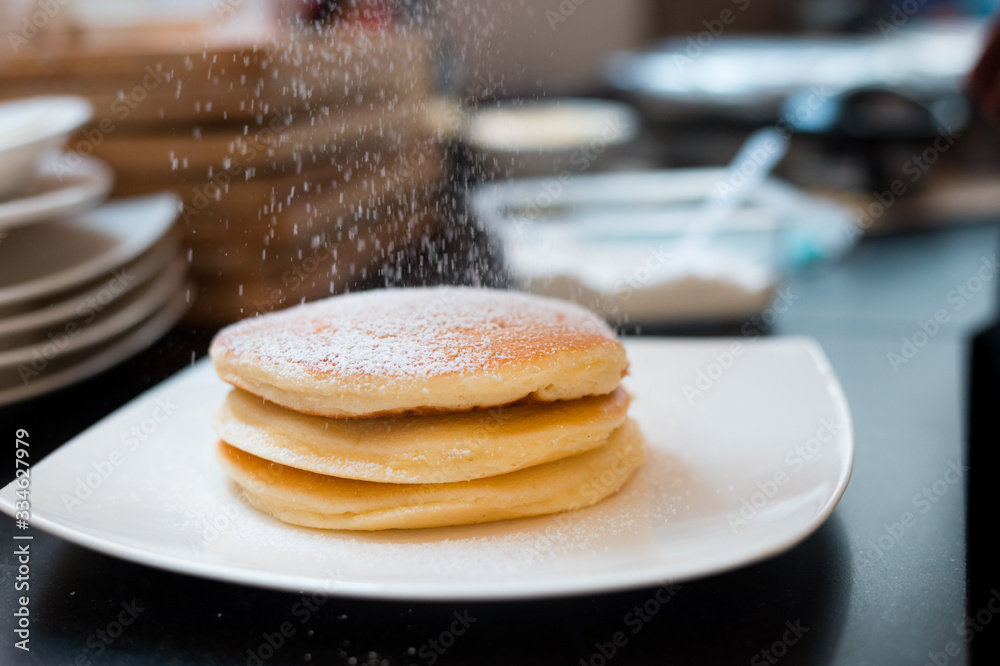 pancakes breakfast with bananas on white dish pancakes breakfast with bananas on white dish