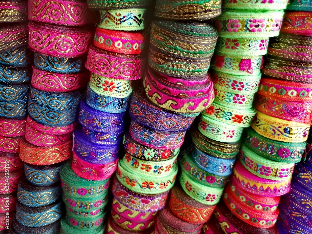 Colorful ribbons sell in the market.