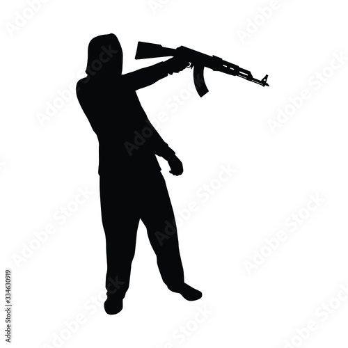 Terrorist with gun silhouette