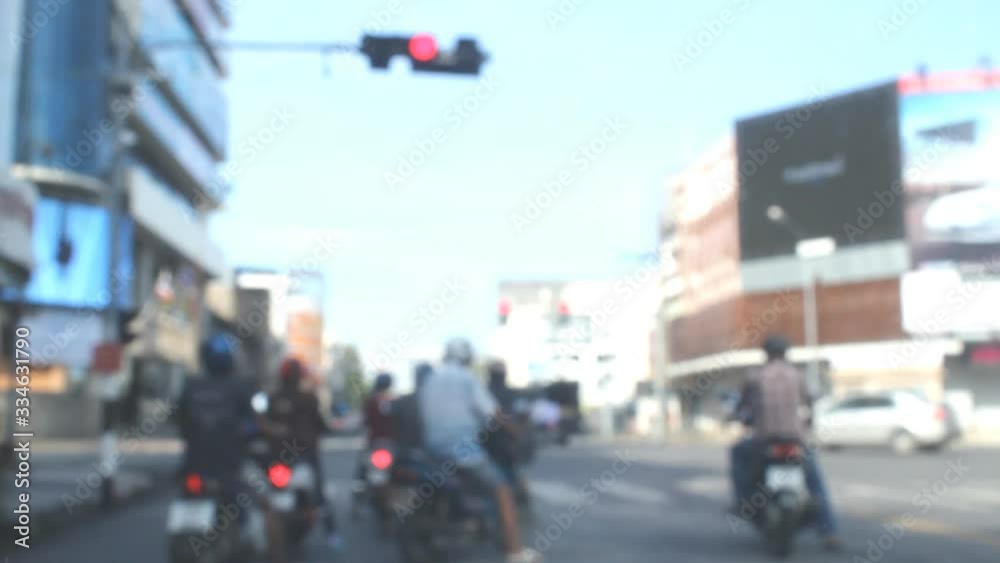 blurred of motorcycle at the intersection Thailand