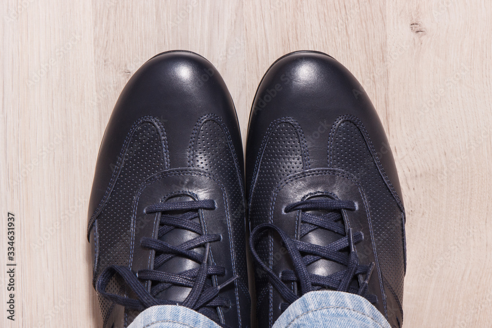 Elegant stylish navy blue shoes for men on white board Elegant stylish navy blue shoes for men on white board