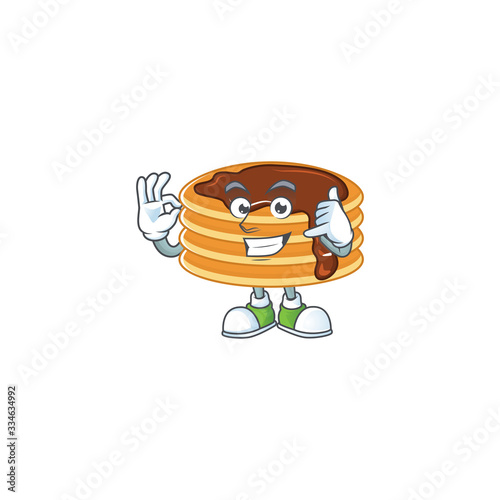 Chocolate cream pancake mascot cartoon design make a call gesture