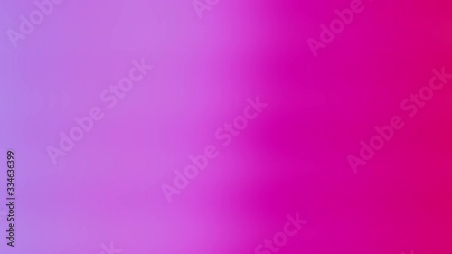 Soft color gradient motion background in purple pink red and orange with a smooth moving modern style. High definition 4k video modern backdrop with a fading gradient color and one minute length.