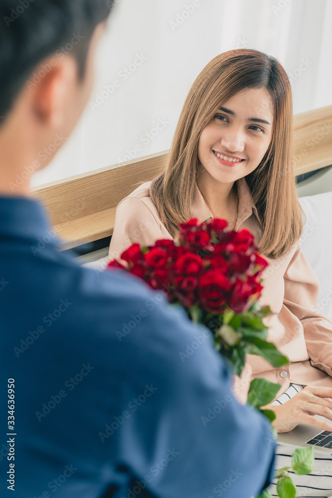 Man hiding flower at back. Man hiding flower at back.