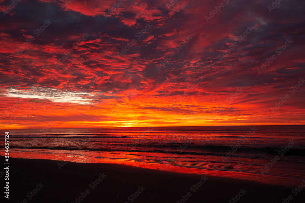 orange fire sunset on beach