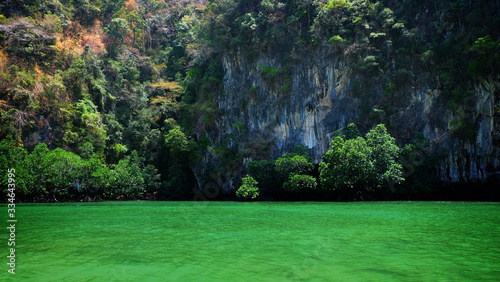 blue lagoon beach bay among the mangrove forest and moutain in South of Thailand.