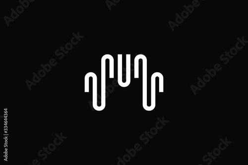 Minimal elegant monogram art logo. Outstanding professional trendy awesome artistic M MU UM initial based Alphabet icon logo. Premium Business logo White color on black background