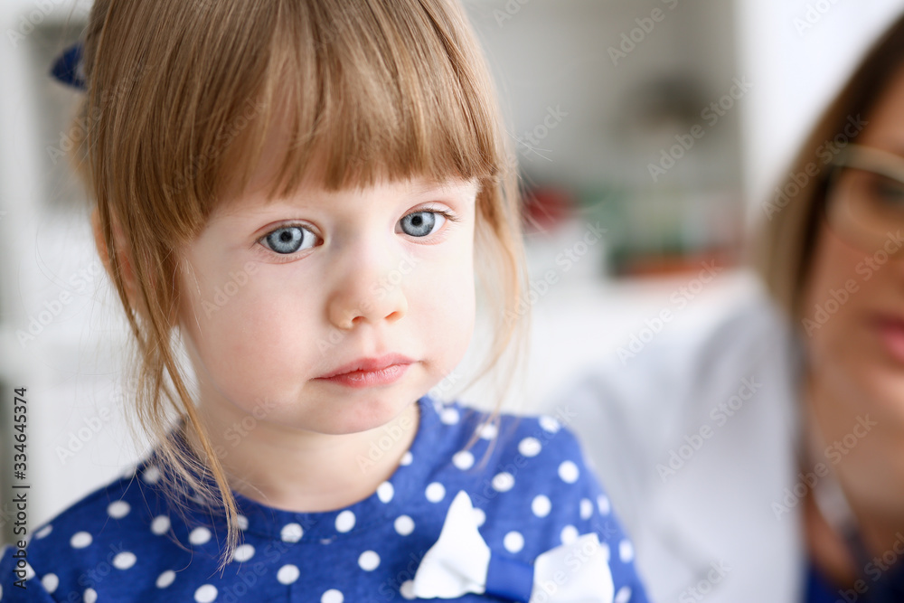 Little child with mother at pediatrician reception. Physical exam cute infant portrait baby aid healthy lifestyle ward round child sickness clinic test high quality and trust concept Little child with mother at pediatrician reception. Physical exam cute infant portrait baby aid healthy lifestyle ward round child sickness clinic test high quality and trust concept