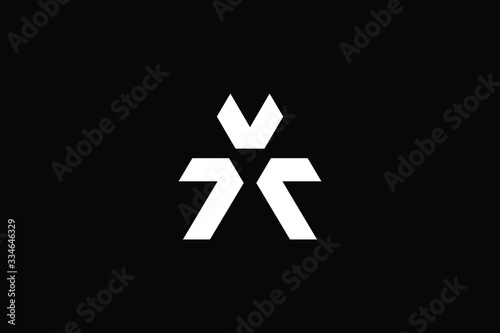Minimal elegant monogram art logo. Outstanding professional trendy awesome artistic AT TA AX XA initial based Alphabet icon logo. Premium Business logo White color on black background