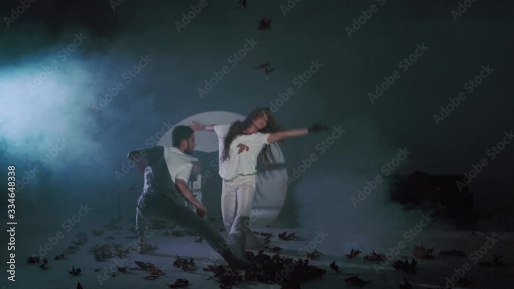 Young Couple Model In Love dance couples holding leaves Young Couple Model In Love dance couples holding leaves