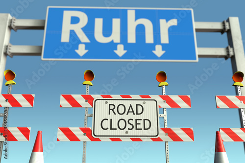 Road barriers at Ruhr city traffic sign. Coronavirus disease quarantine or lockdown in Germany conceptual 3D rendering © Alexey Novikov