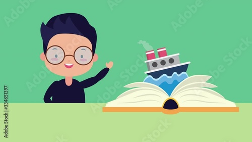 world book day celebration with little boy and ship boat photo