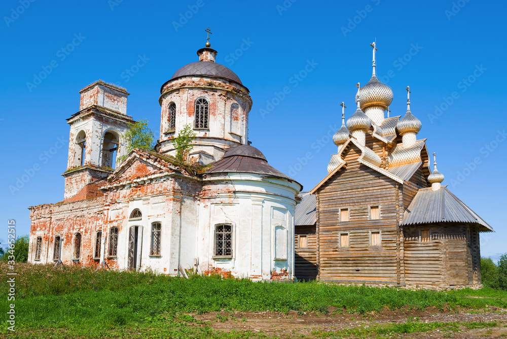 Temples of the Paltoga village on a sunny August day. Vologda region, Russia