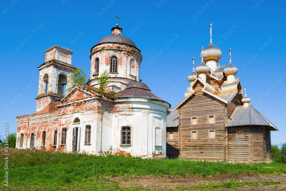 Temples of the Paltoga village on a sunny August day. Vologda region, Russia Temples of the Paltoga village on a sunny August day. Vologda region, Russia