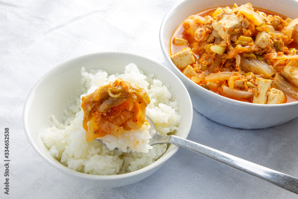 Korean Tuna kimchi stew which is called Chamchi Kimchi Jjigae with rice Korean Tuna kimchi stew which is called Chamchi Kimchi Jjigae with rice