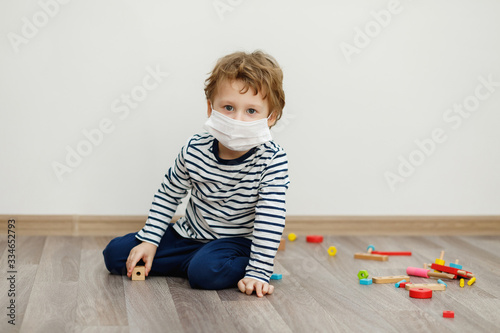 Boy in mask. Stay home concept, quarantine from Coronavirus Covid-19