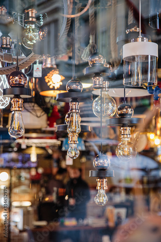 Beautiful bright modern lamp bulbs in electricity department of decor store © Khrystyna Pochynok