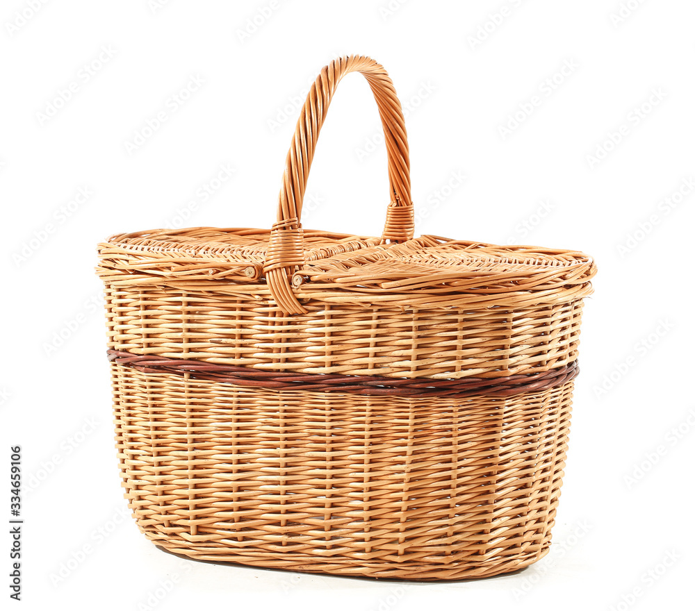 Obraz premium Wicker basket on white background