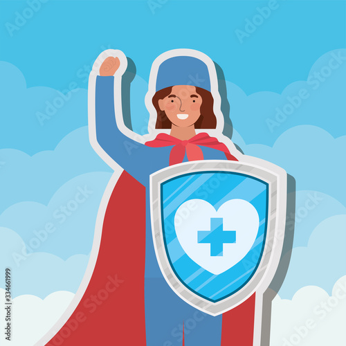 woman doctor hero with cape and shield against 2019 ncov virus vector design
