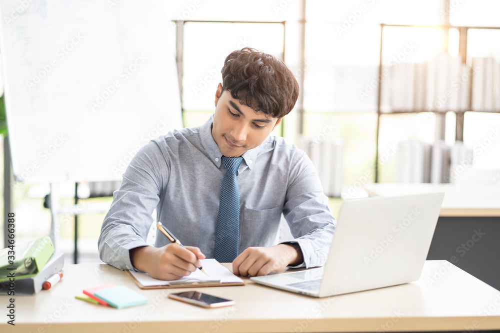 asian businessman employee working in modern office, using pen writing on clipboard researching information, concept of working corporate company planning, brainstorming business ideas and strategies asian businessman employee working in modern office, using pen writing on clipboard researching information, concept of working corporate company planning, brainstorming business ideas and strategies