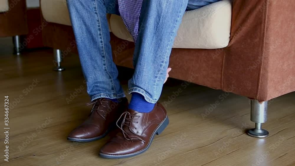 man wearing shoe and preparing to go out man wearing shoe and preparing to go out